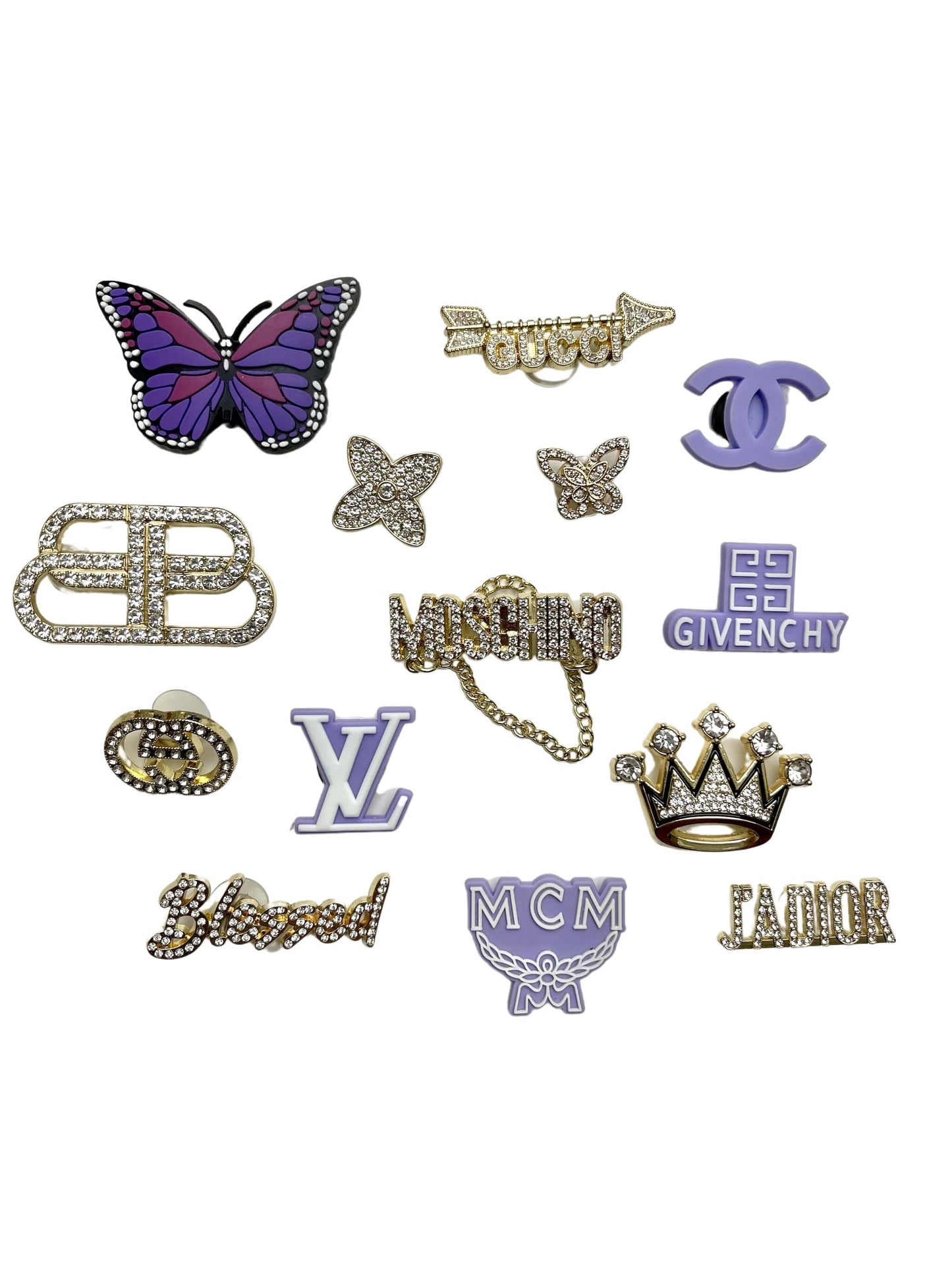 Les 14 charms du set "Purple Wave" disposés à plat sur fond blanc